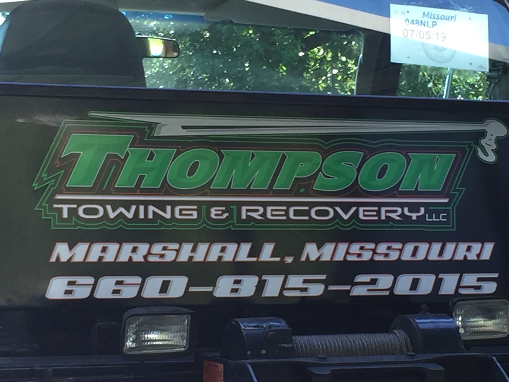 Image of the side of the tow truck.