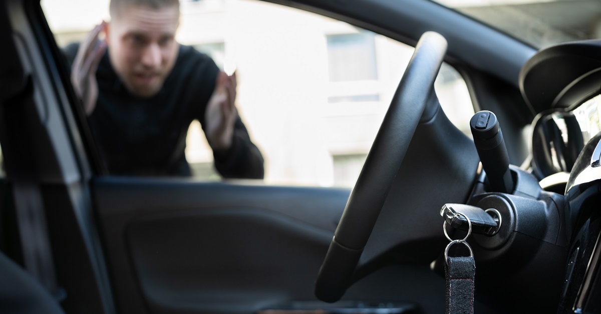 Image of a man locked out of his car.